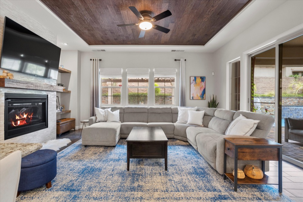 Great room opening toward the pool and patio