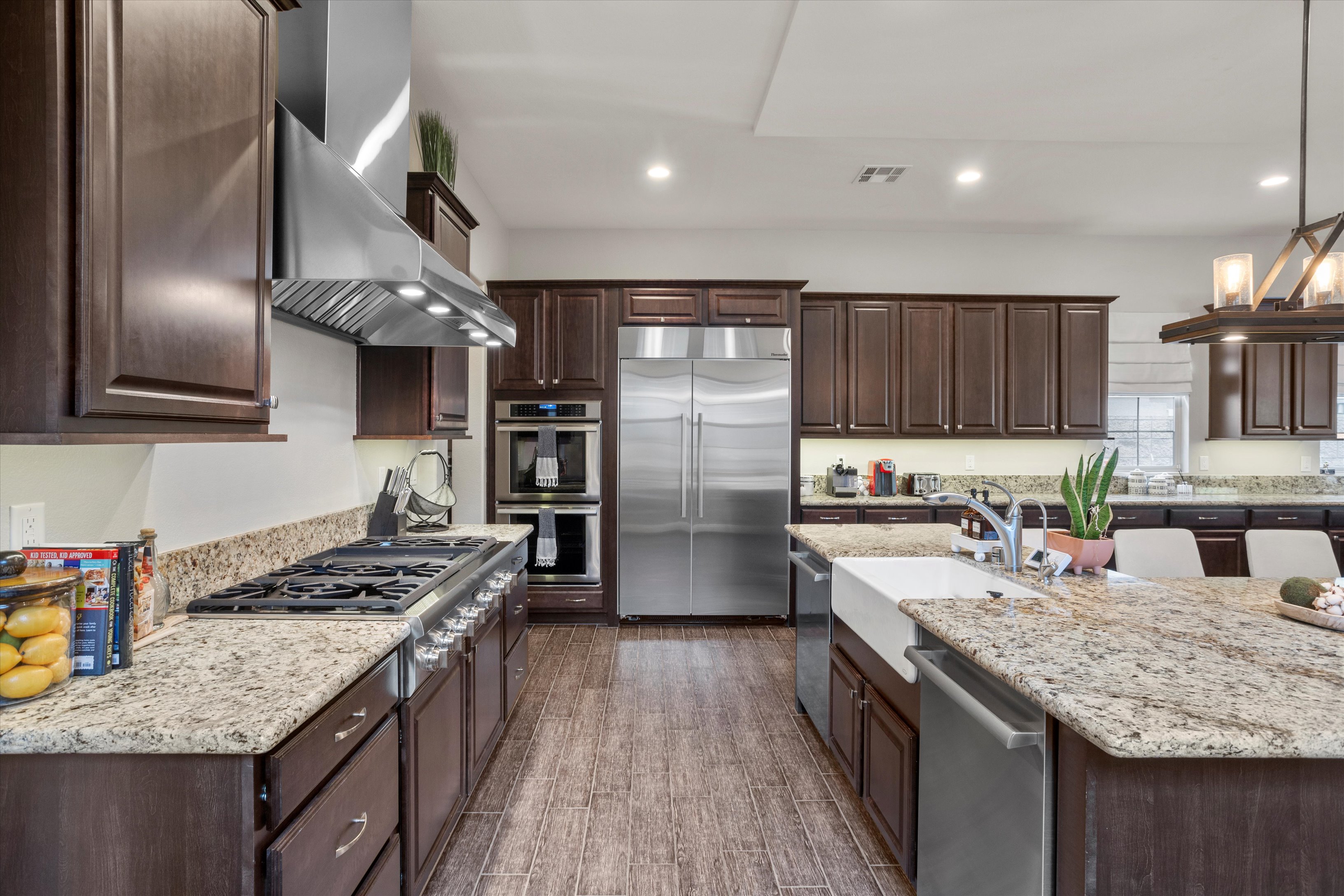 Kitchen with large island and professional appliances